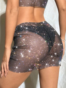 Image of 2024 Summer Rhinestone Fishnet Skirt For Women Sexy Hollow See Through Side Split Mini Skirt Beach Party Club Clothing