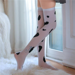 Image of Shu Yao erotic cow stockings sex stockings long milky white spotted socks high top over the knee W28